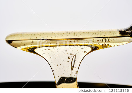 Photo of a sugar paste for depilation hair removal procedure. Texture. Photo of a sugar paste for depilation hair removal procedure. Texture. 125118526