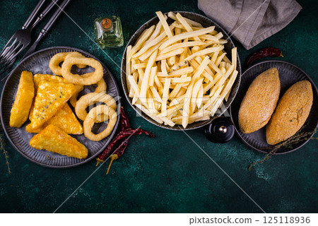 Frozen food assortment. Potato hashbrowns and french fries Frozen food assortment. Potato hashbrowns and french fries 125118936