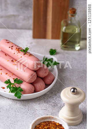 Boiled pork sausages with spices 125118988