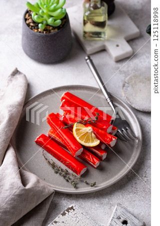 Surimi sticks from crab meat Surimi sticks from crab meat 125118998