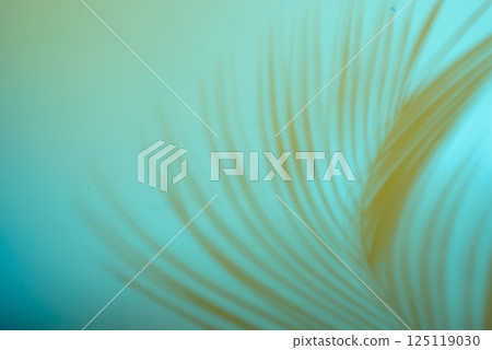 Tropical leaves in neon light with duotone shadows 125119030