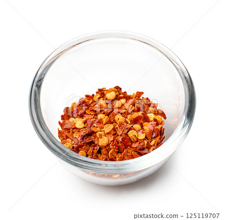 bowl of dried chili flakes 125119707