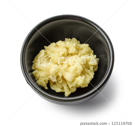 bowl of grated ginger 125119708