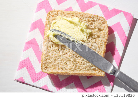 bread slice with whipped butter smear bread slice with whipped butter smear 125119826