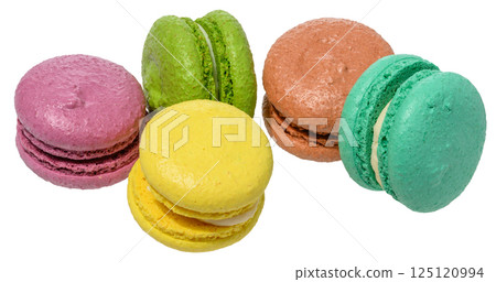 An assortment of colorful macarons, isolated background. Dessert have a smooth, delicate shell and a creamy filling 125120994