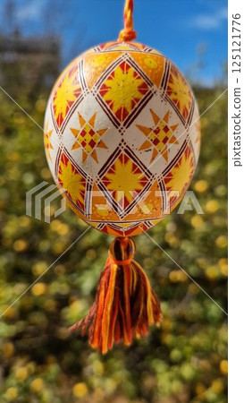 Explore traditional Easter eggs with vibrant Ukrainian pysanka featuring geometric patterns and colors that reflect cultural heritage and seasonal joy during Easter celebrations Explore traditional Easter eggs with vibrant Ukrainian pysanka featuring geometric patterns and colors that reflect cultural heritage and seasonal joy during Easter celebrations 125121776