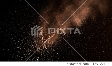 Velvet-textured powder softly spread on a dark background 125122192