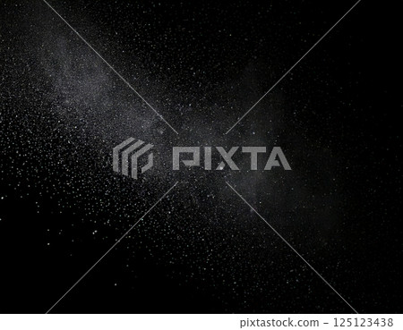 Starch powder dispersed in the air with a black background, space for text, landscape template. Starch powder dispersed in the air with a black background, space for text, landscape template. 125123438