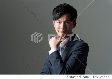 Young office worker in suit 125123446