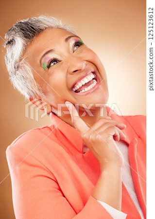 Makeup, studio and senior woman thinking of cosmetics idea, inspiration or beauty tips with professional clothes, fashion and unique style. Creative, art design and old woman model face or headshot 125123612