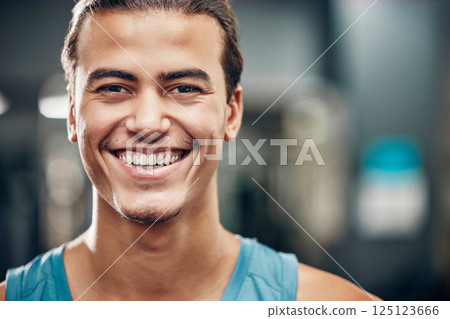 Portrait, gym and sports man with smile for wellness, fitness and healthy lifestyle, wellness with motivation, commitment and our vision. Face of an athlete with workout, exercise or training mission 125123666