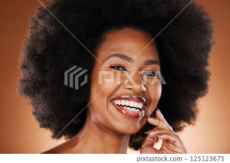 Black woman in beauty, makeup and face with hair care portrait, natural hair and cosmetics with afro against studio background. Cosmetic, clean and glow with healthy skin and facial treatment. 125123675