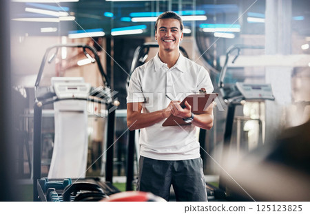 Gym, fitness and portrait of a personal trainer with a clipboard for a training consultation. Happy, smile and sports coach or athlete with a wellness, health and exercise checklist in workout center 125123825