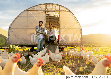 Agriculture, chicken and sustainability with of black couple on farm for growth, food and environment. Countryside, farmer and eggs with man and woman in field for livestock, poultry and harvest 125123901