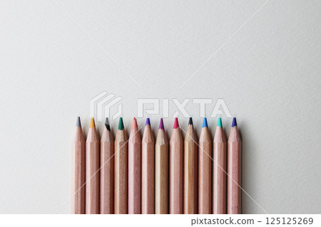 White paper and colored pencils White paper and colored pencils 125125269