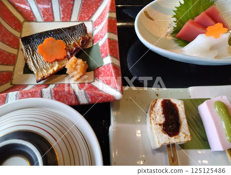 Japanese meal set with various dishes Japanese meal set with various dishes 125125486