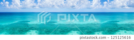 Atlantic ocean with reef and azure water, tropical destinations. Aerial view. Long banner 125125616