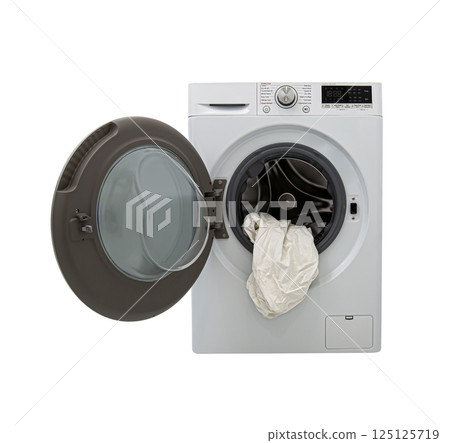 White front loading washing machine with open door with washed bedding inside 125125719