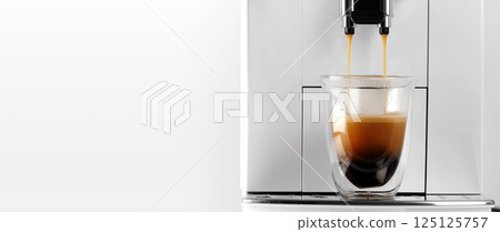 White coffee machine making espresso. Americano dropping in white cup. Preparation process 125125757