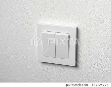 Switch on or off button on white wall 125125775