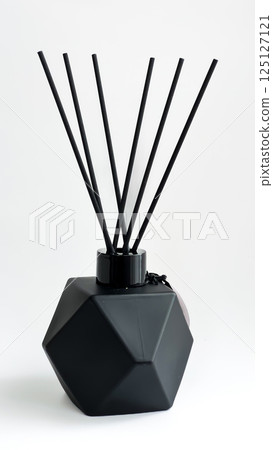 Black aroma diffuser on white background 125127121