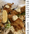 Fried oysters with tartar sauce 125127318