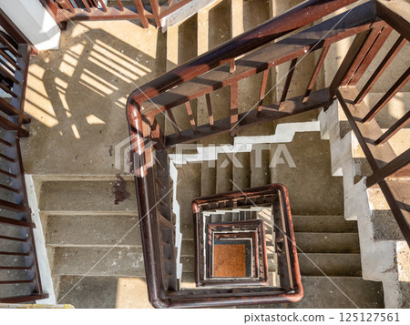 Top-Down View of a Spiral Staircase Inside a Bird-Watching Tower. Top-Down View of a Spiral Staircase Inside a Bird-Watching Tower. 125127561