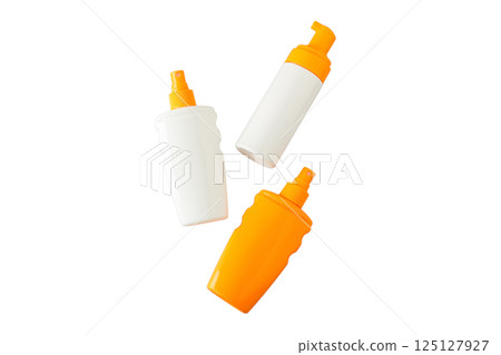 Three sunscreen bottles on a white background, isolated on white 125127927