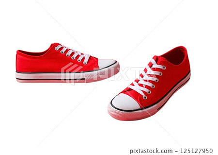 Casual red shoes ideal for daily activities and casual outings, isolated on white 125127950