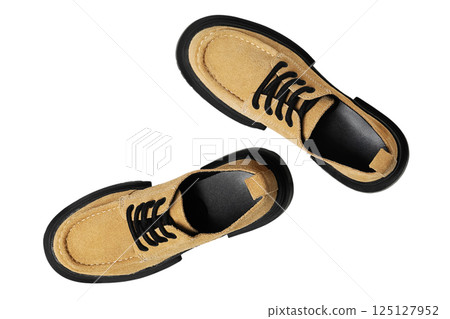 Suede shoes with black soles for comfort and daily wear, isolated on white Suede shoes with black soles for comfort and daily wear, isolated on white 125127952