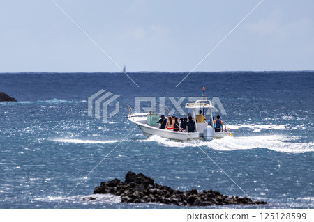 This is where the first ferry boat leaves Nakagi Port for Hirizohama Beach in the morning. Snorkelers and skin divers 125128599