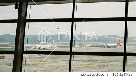Chengdu, Sichuan, China. View From Inside Chengdu Tianfu International Airport. Tianfu Airport. Airplanes On Far Background 125128758
