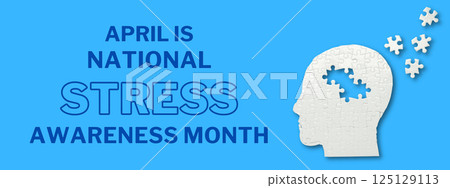 Stress month, head made of white puzzles on a blue background with text, top view 125129113