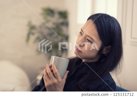 Middle-aged woman negative Middle-aged woman negative 125131712