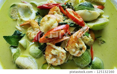 Fresh Seafood Dish with Vibrant Green Curry and Colorful Vegetables. Thai Food. Fresh Seafood Dish with Vibrant Green Curry and Colorful Vegetables. Thai Food. 125132160