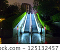 A casual scene (escalator at night) 125132457