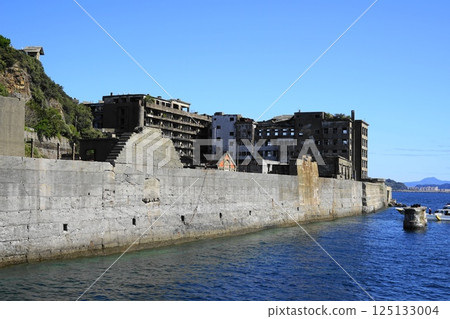 A view of Gunkanjima floating between the blue of the sea and the sky April Nagasaki 49 Gunkanjima 125133004