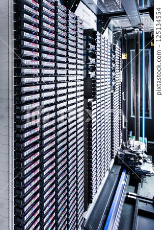 stacks of magnetic tapes used for data storage 125134554