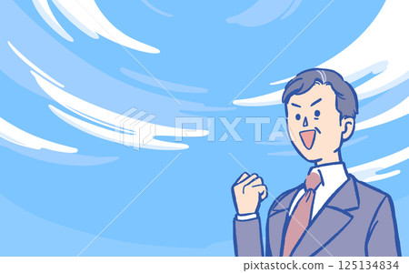 A man in a suit doing a fist pump under the blue sky 125134834
