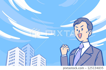 A man in a suit doing a fist pump under the blue sky 125134835