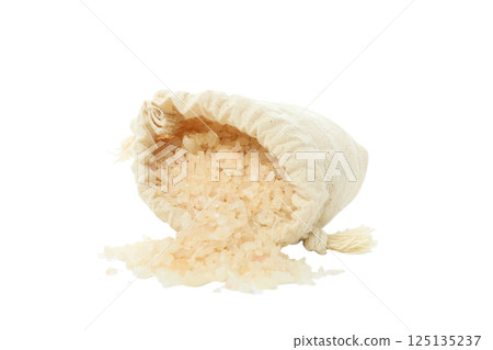Sea salt in bag on white background, close up 125135237
