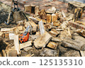 Chainsaw and wood 125135310
