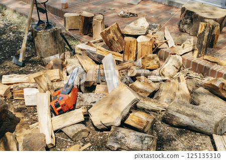 Chainsaw and wood Chainsaw and wood 125135310