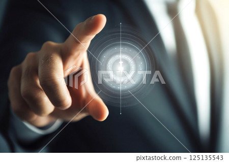 A hand pressing a glowing digital button surrounded by futuristic circles, symbolizing power, activation, and unlocking new possibilities. The sleek design represents modern technology, innovation 125135543