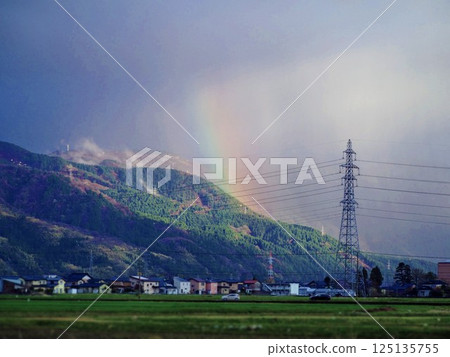 Rainbow and rural landscape 125135755