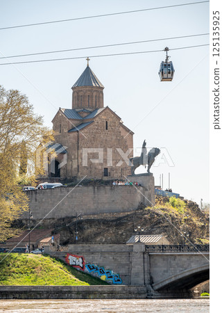 Metekhi church and King Vakhtang Gorgasali monument in Tbilisi, Georgia 125135925