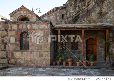 Metekhi church of the Nativity of the Mother of God on a cliff above Mtkvari river in Tbilisi, Georgia Metekhi church of the Nativity of the Mother of God on a cliff above Mtkvari river in Tbilisi, Georgia 125136164