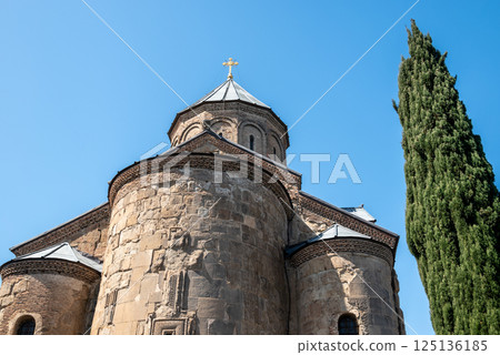 Metekhi church of the Nativity of the Mother of God on a cliff above Mtkvari river in Tbilisi, Georgia 125136185