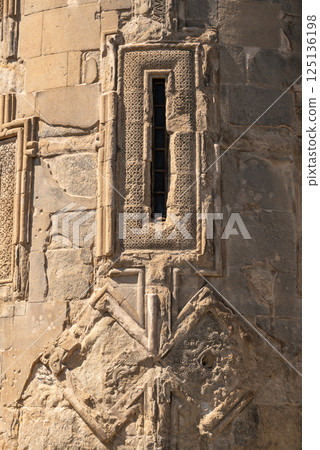 Facade of the Metekhi church of the Nativity of the Mother of God on a cliff above Mtkvari river in Tbilisi, Georgia 125136198