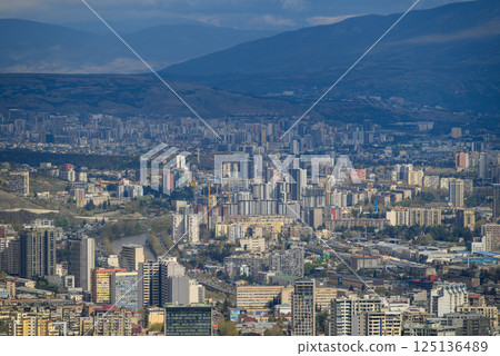 Cityscape of Tbilisi, capital of Georgia, aerial panoramic view from Mtatsminda Park Cityscape of Tbilisi, capital of Georgia, aerial panoramic view from Mtatsminda Park 125136489